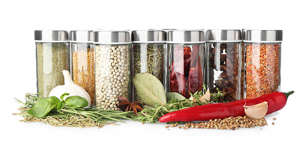 istock Many different aromatic spices in jars isolated on white 2245344596