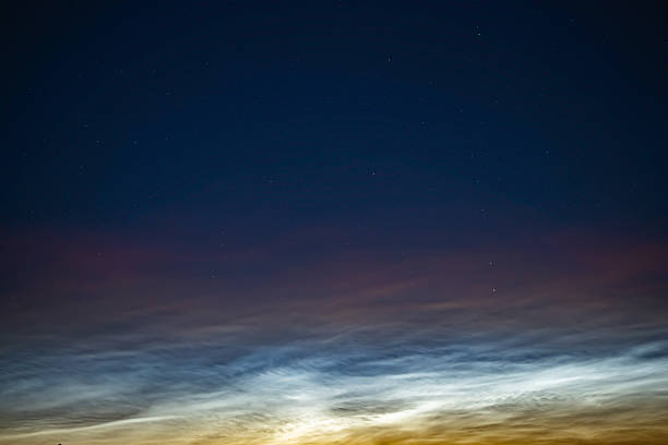 istock Silver clouds in the night sky in Russia. 2245346630