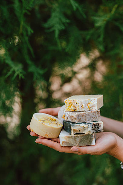 handcrafted soap display, thoughtful gift ideas for artisanal soaps in natural outdoor environments