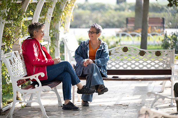 istock Two female friends having a great time in the park 2245363018
