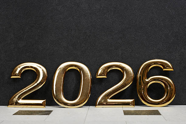 istock golden 2026 numerals stand on a tiled surface against a dark backdrop, creating festive New Year vibes and a premium celebratory feel suitable for events, marketing, and branding visuals 2245365656