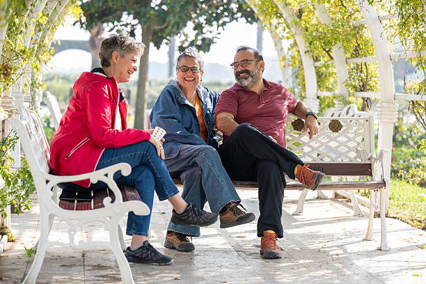 istock Three friends spending time in the park 2245368534