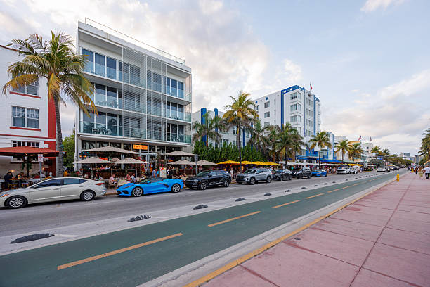 Miami, Florida, USA - May 31, 2025: Crowded Ocean Drive in Miami, packed with people, cars, and vibrant nightlife