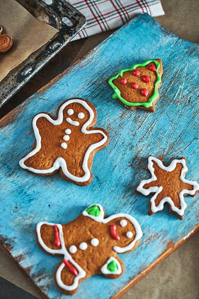 istock Baking Gingerbread Christmas Cookies in the Oven 2245374120
