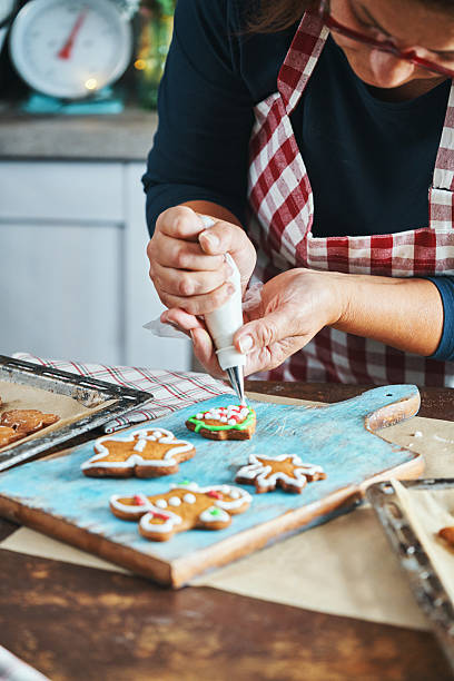 istock Baking Gingerbread Christmas Cookies in the Oven 2245374123