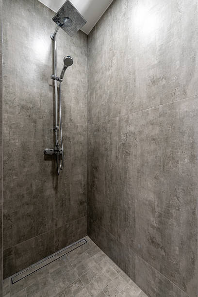 istock Modern Home Walk-In Shower With Sleek Design and Gray Tiled Walls 2245377564