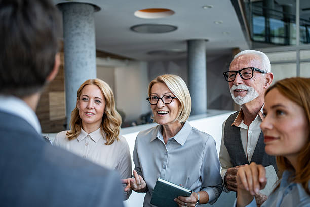istock Business professionals sharing ideas during office meeting discussion 2245378507