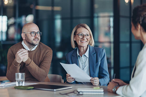 istock Company management discussing investments 2245379556