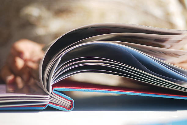 istock Opened book displaying colorful pages and content 2245381093