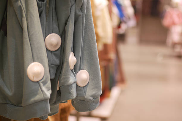 security alarm on a Colorful clothing displayed in a retail store setting.