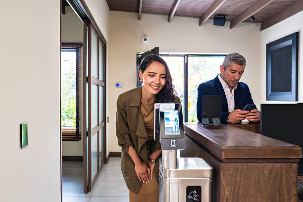 istock Biometric facial recognition access in a modern office. 2245384424