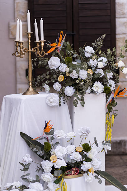 istock Elegant wedding floral arrangement with candles 2245386364