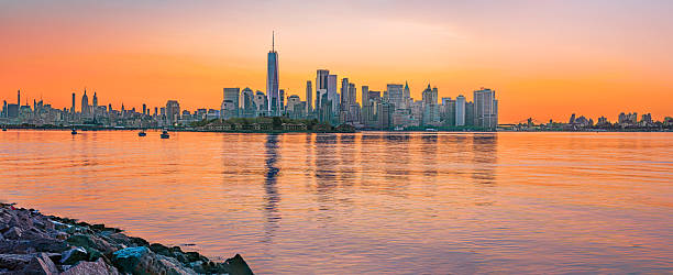 istock New York City skyline at sunset over water. 2245390408