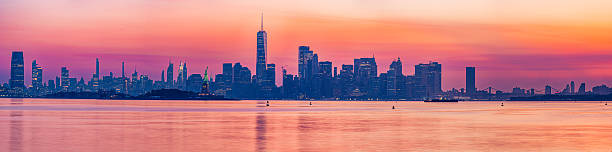 istock New York City skyline at sunset over water. 2245390452