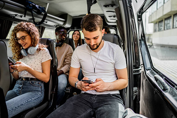 istock Students traveling by bus using smartphones 2245391420