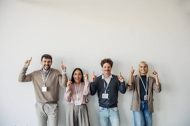 istock Business team pointing up with great idea 2245391719