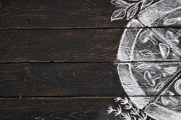 Creative chalk drawing of pizza with herbs and ingredients on dark wooden background. Food concept, restaurant menu design, Italian cuisine idea.