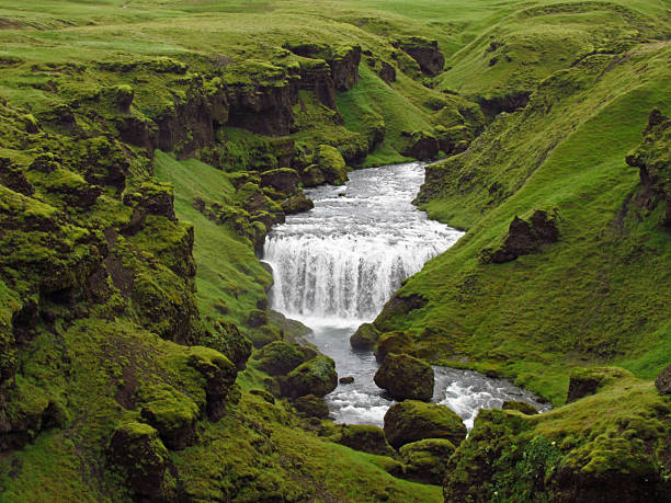 Big Waterfall in Lush Green Canyon in Iceland
