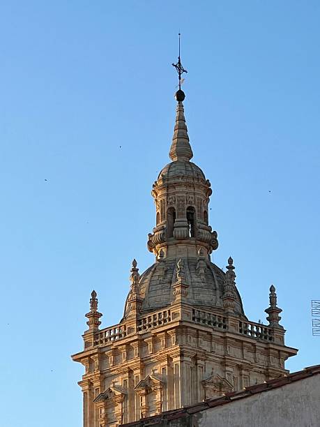 istock Burgo de osma cathedral tower bell against blue sky 2245397758