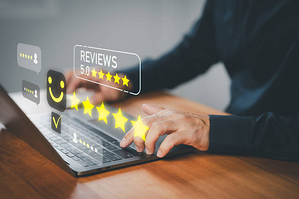 istock Customer giving 5 star review online using laptop, showing satisfaction and positive feedback, ideal for business reputation, testimonial, customer experience, marketing, and e-commerce concept. 2245406606