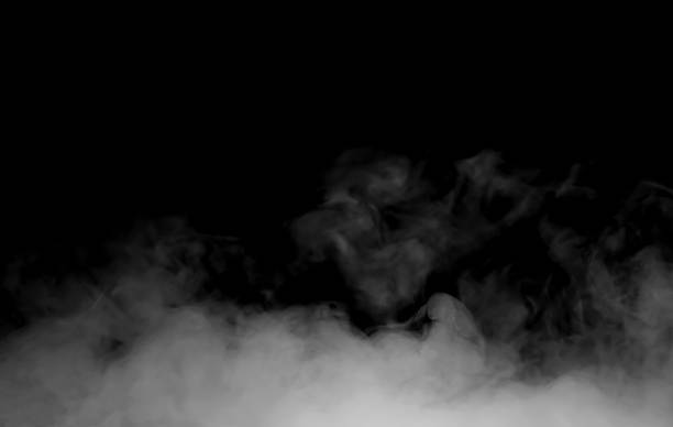 istock Realistic white smoke on a black background creates a mysterious and dramatic atmosphere, perfect for visual effects, horror scenes, or product presentations that need a moody and cinematic look. 2245412979