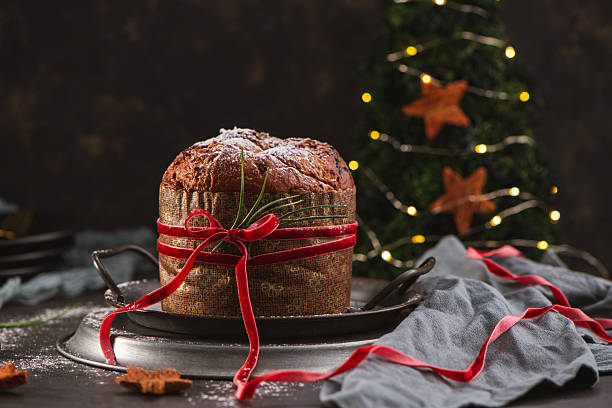 istock Festive Panettone with Christmas Tree Background 2245413405