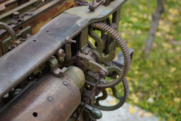 istock Close-up view of mechanical gears and components of an old machine 2245414321