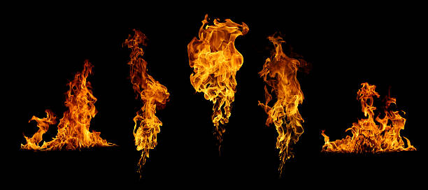 istock Collection of realistic orange flames isolated on a black background, showing different fire shapes and movements, perfect for visual effects, energy, or dramatic design projects. 2245415787