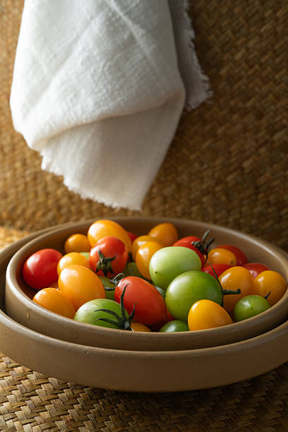 Green, red, and yellow cherry tomatoes
