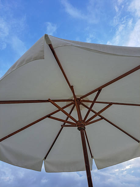 istock Beach Umbrellas on Seminyak Beach, Bali During a Beautiful Sunset 2245421322