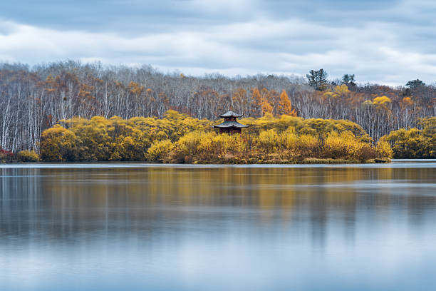 istock The Lonely Pavilion on the Autumn Lake 2245421535