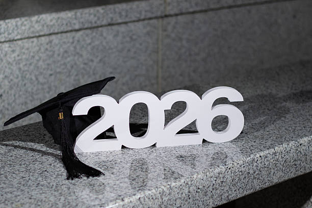 istock Graduation Year 2026 Displayed With a Black Cap on a Granite Surface During a Celebration Event 2245425157