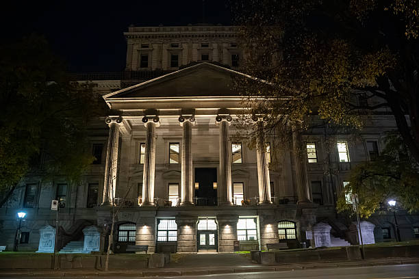 istock Night view of Montreal courthouse building with illuminated columns. 2245426781