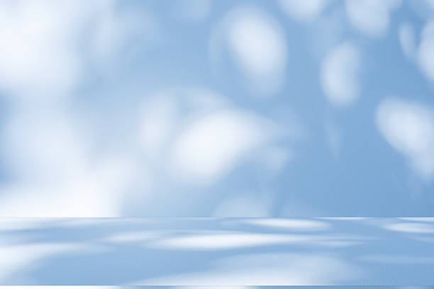 istock Studio style background wall decoration presentation uses white and blue tones. with shadows cast from a nearby window, concept creating a decorative 2245430963