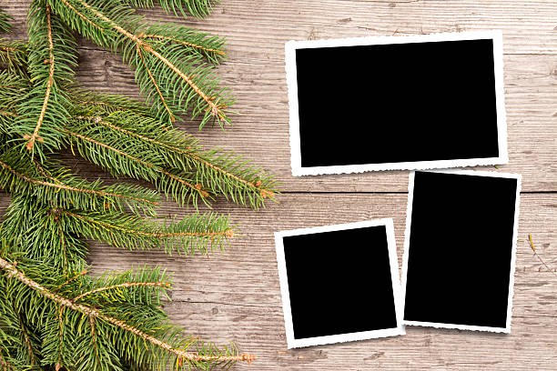 istock Christmas background with fir branches on wooden board 2245442785