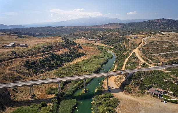 istock Aerial view on road bridge over river near Geropotamos beach on Crete, Greece. 2245449768