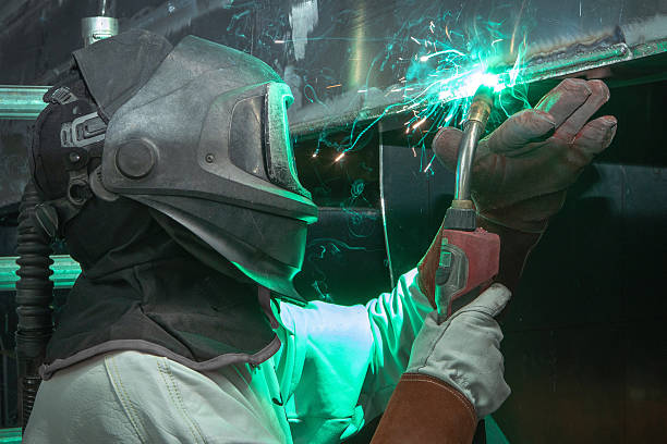 istock Welder at work at shipyard. Welding aluminium 2245459543