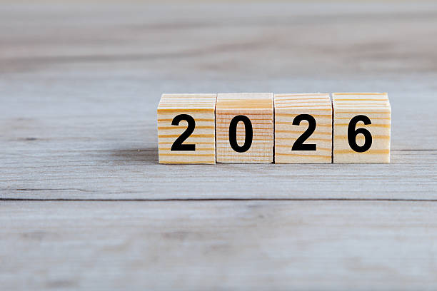 istock Wooden blocks with image of 2026 on wooden table surface. 2245462896