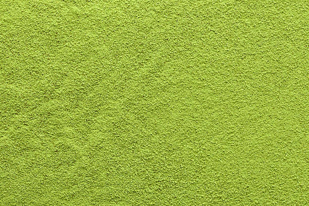 istock Fine matcha powder forms an even green surface with subtle texture, ideal as a natural background for food, tea or wellness design. 2245462903