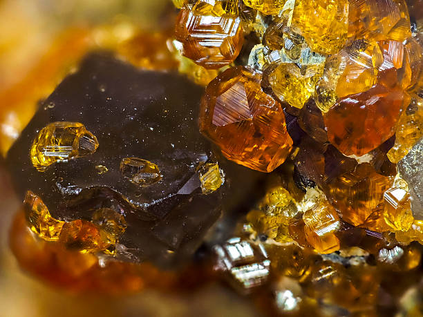 Close-up of an unrecognizable female Caucasian jeweler looking at a gemstone.