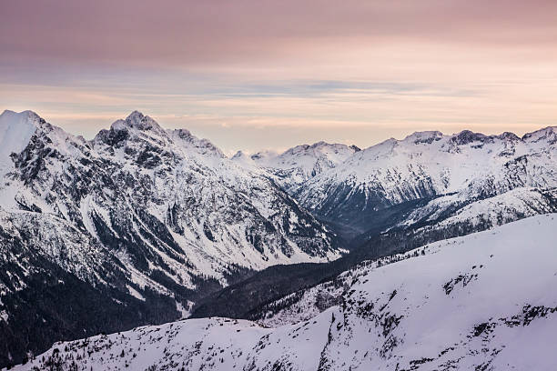 Elevated view of snowcapped mountain ranges at sunset, Garibaldi Park