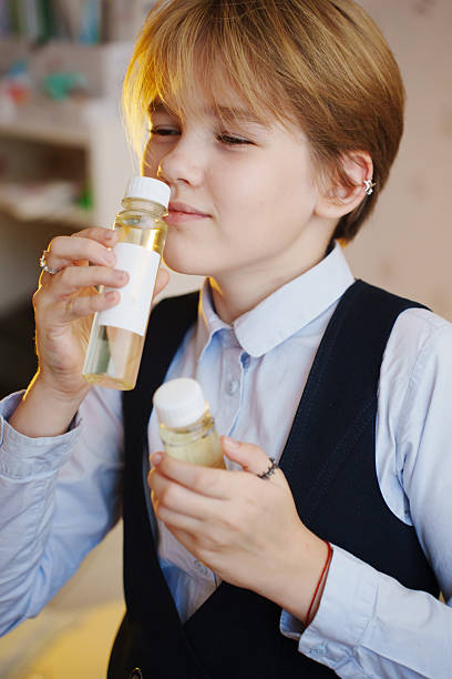 istock Enjoying the aroma of diffuser liquid in a cozy indoor setting 2245465503
