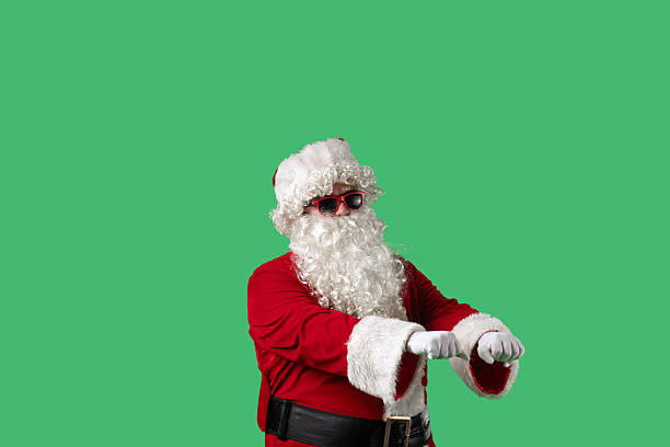 istock Santa Claus dances cheerfully against a green chroma key background 2245470301