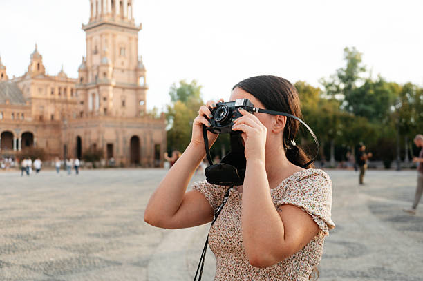 istock Tourist taking a photo with a vintage camera 2245472290