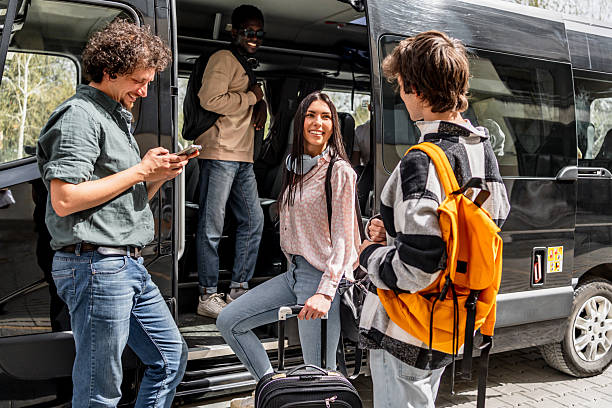 istock Happy diverse young people traveling by bus 2245474165