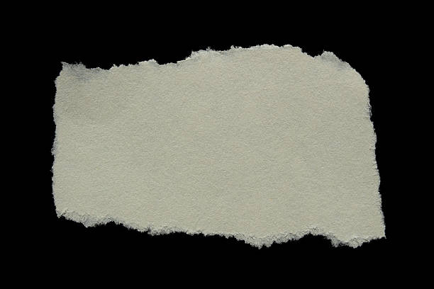 istock Torn paper piece isolated on black background 2245476665