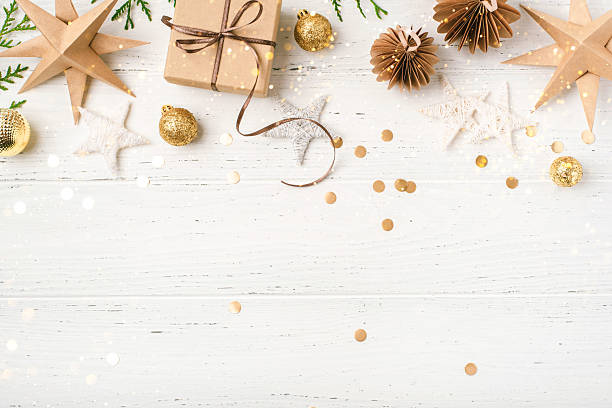 istock Festive Christmas background with gift box and Christmas decorations 2245477052