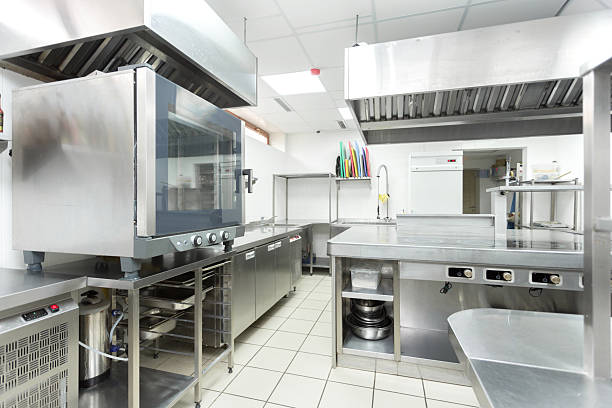 istock Modern kitchen setup with stainless steel appliances and clean countertops 2245479614