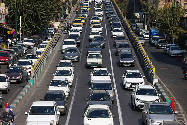 Cars and motorbikes are seen in heavy traffic during rush hour along major streets in Tehran, Iran. Congestion is a common issue in the capital, reflecting the city’s growing population and dependence on private vehicles.