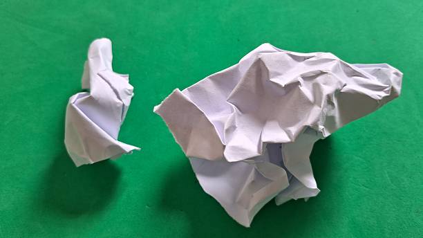 istock Crumpled paper on a green background 2245487031
